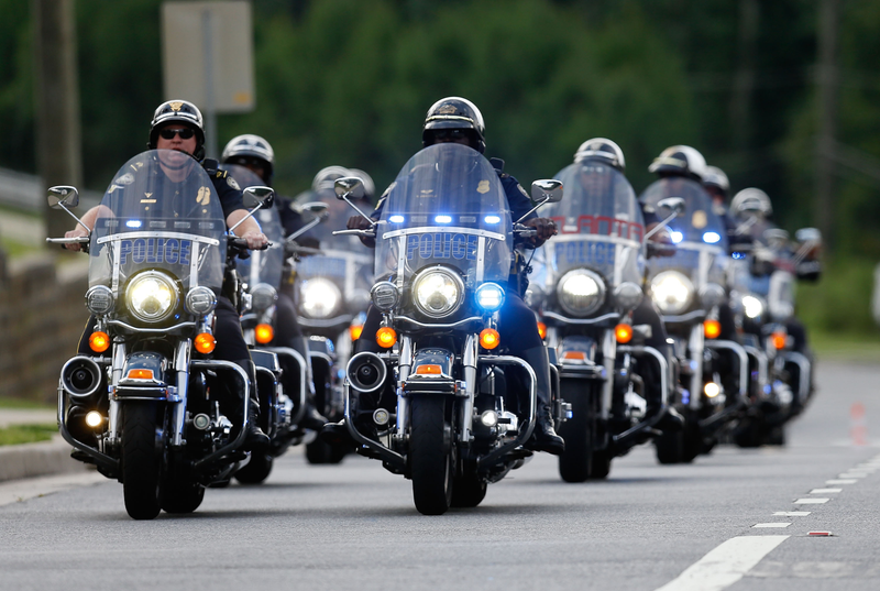 Illustration for article titled Michigan State Cops Prove, Once Again, That Harleys Have No Place On The Police Force